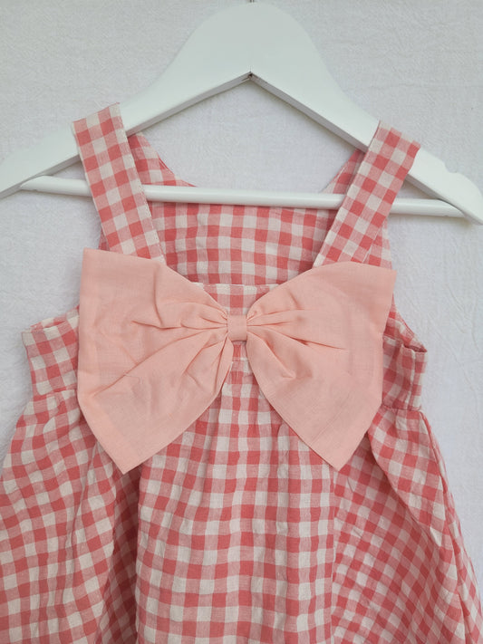 Pink gingham dress with bow