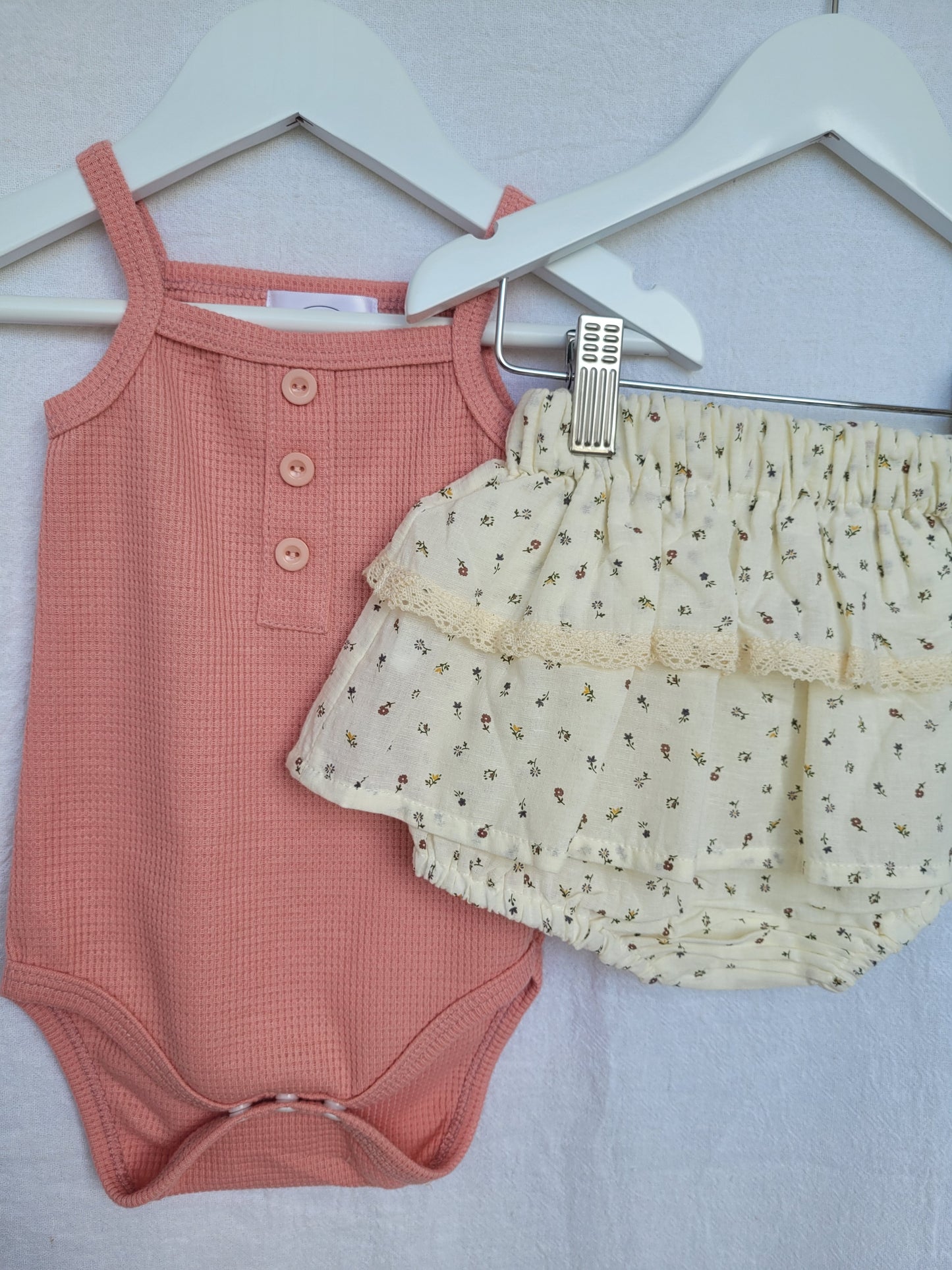 Pink waffle knit bodysuit