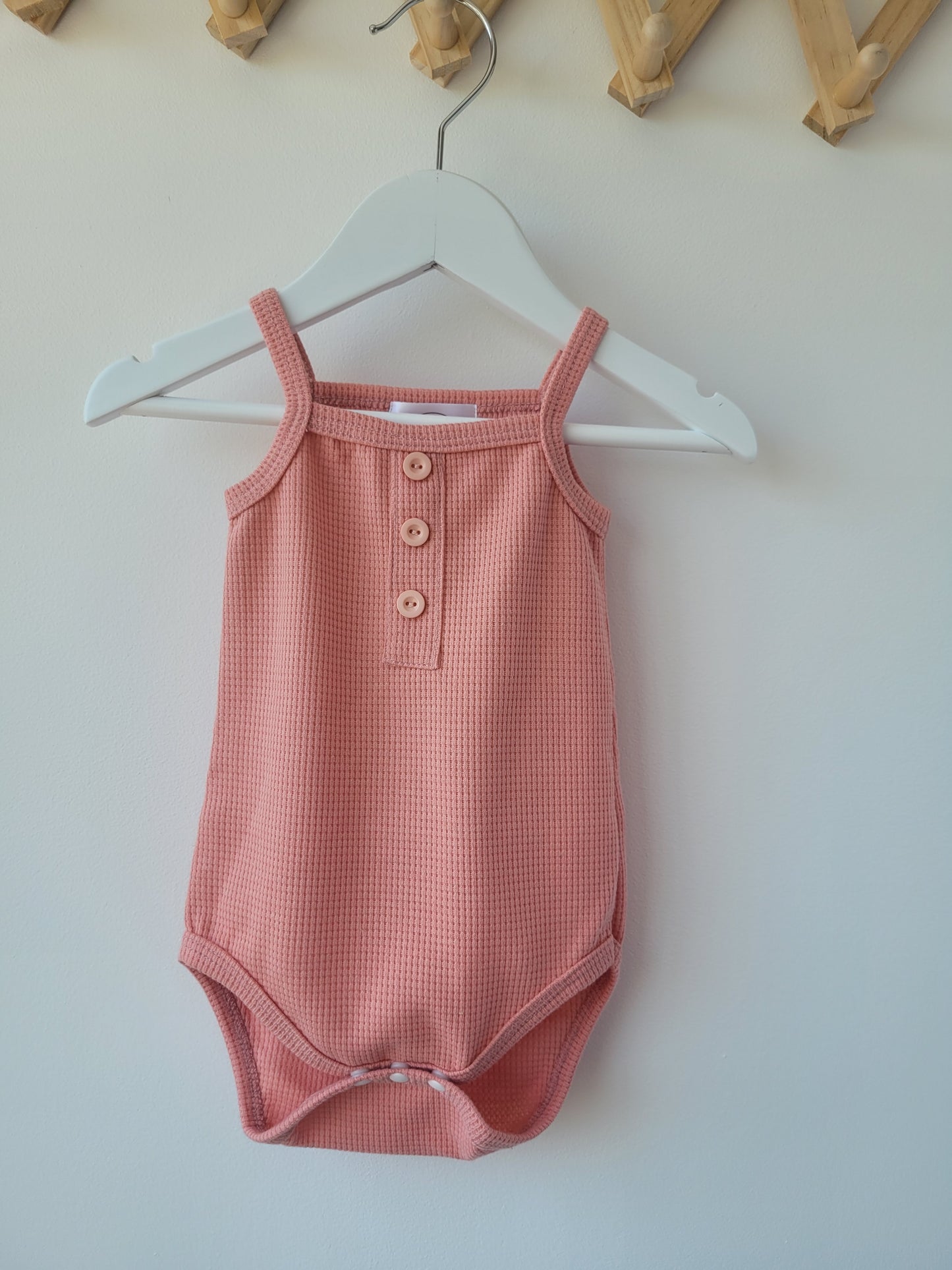 Pink waffle knit bodysuit