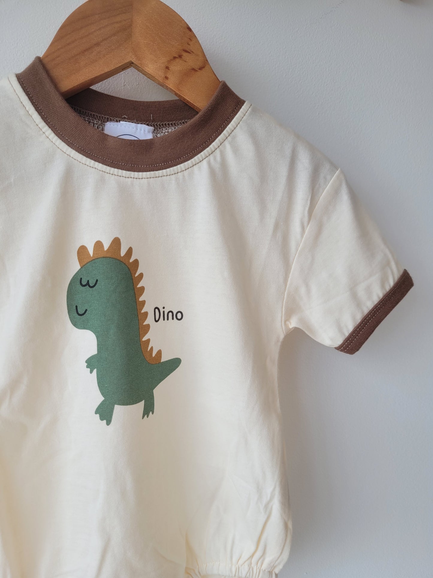 Happy dino romper brown