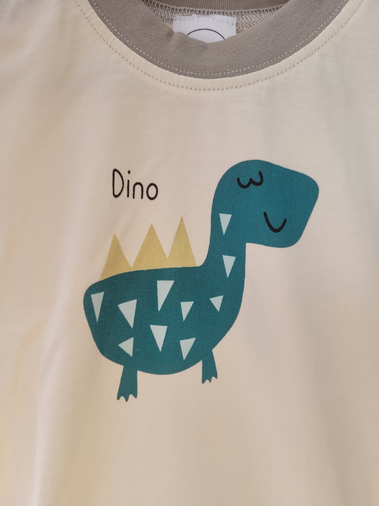 Happy dino romper