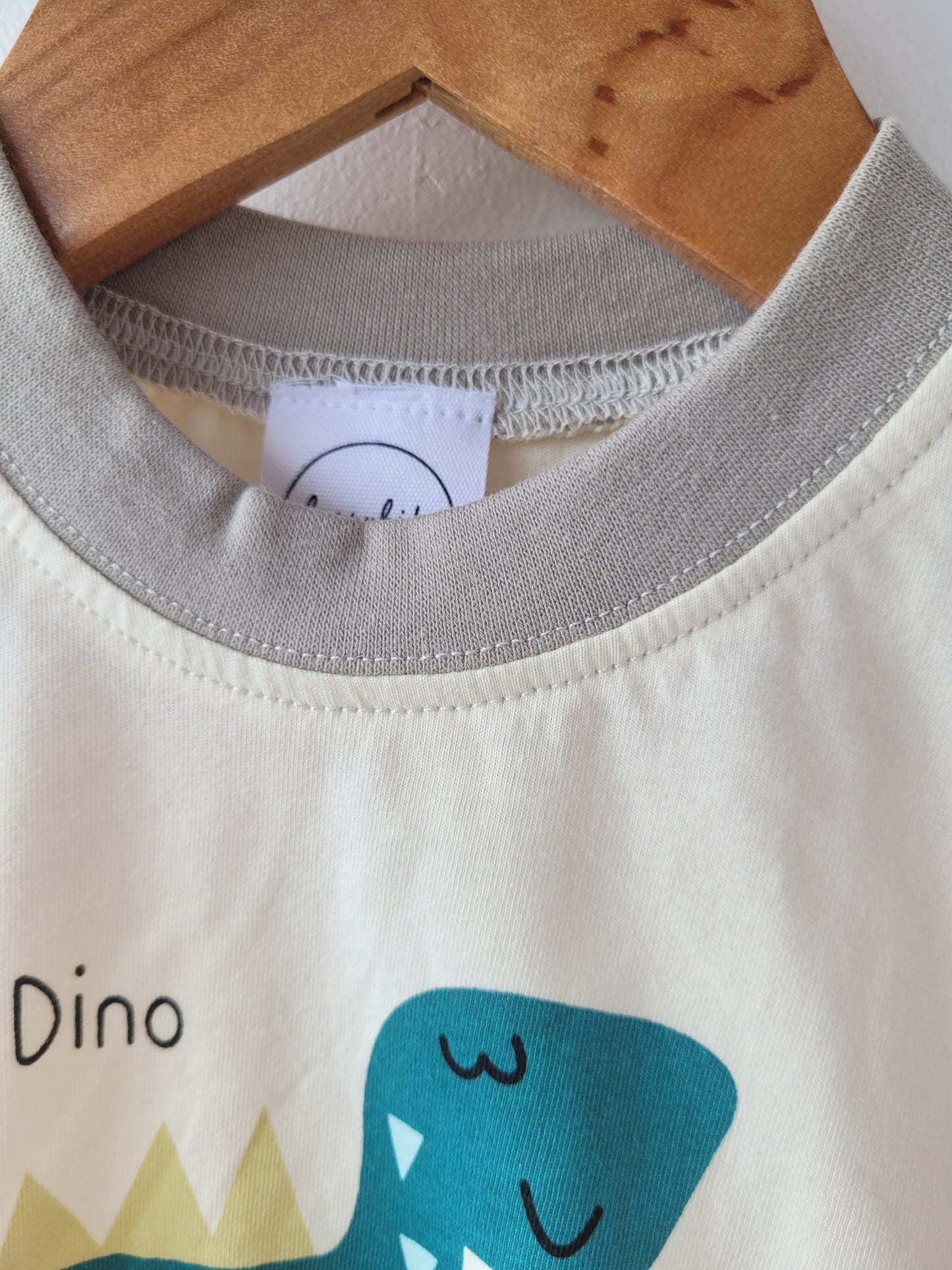 Happy dino romper