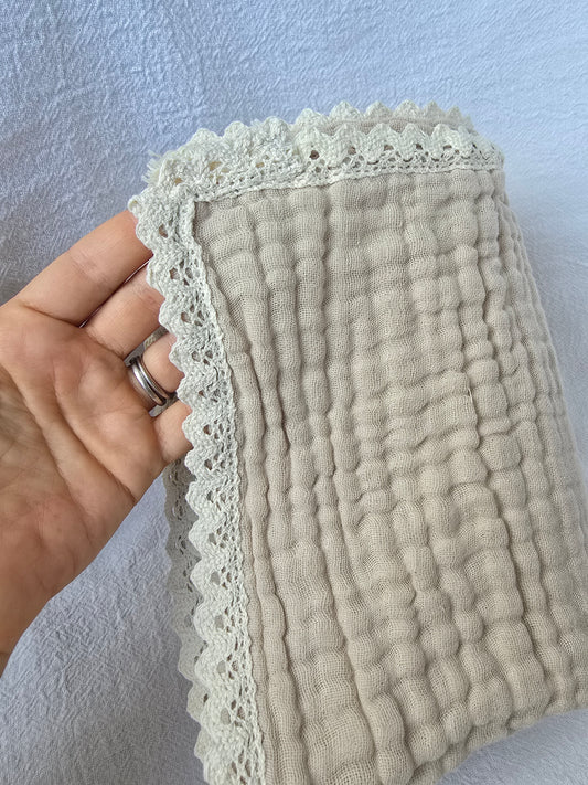 Cotton muslin blanket in sand