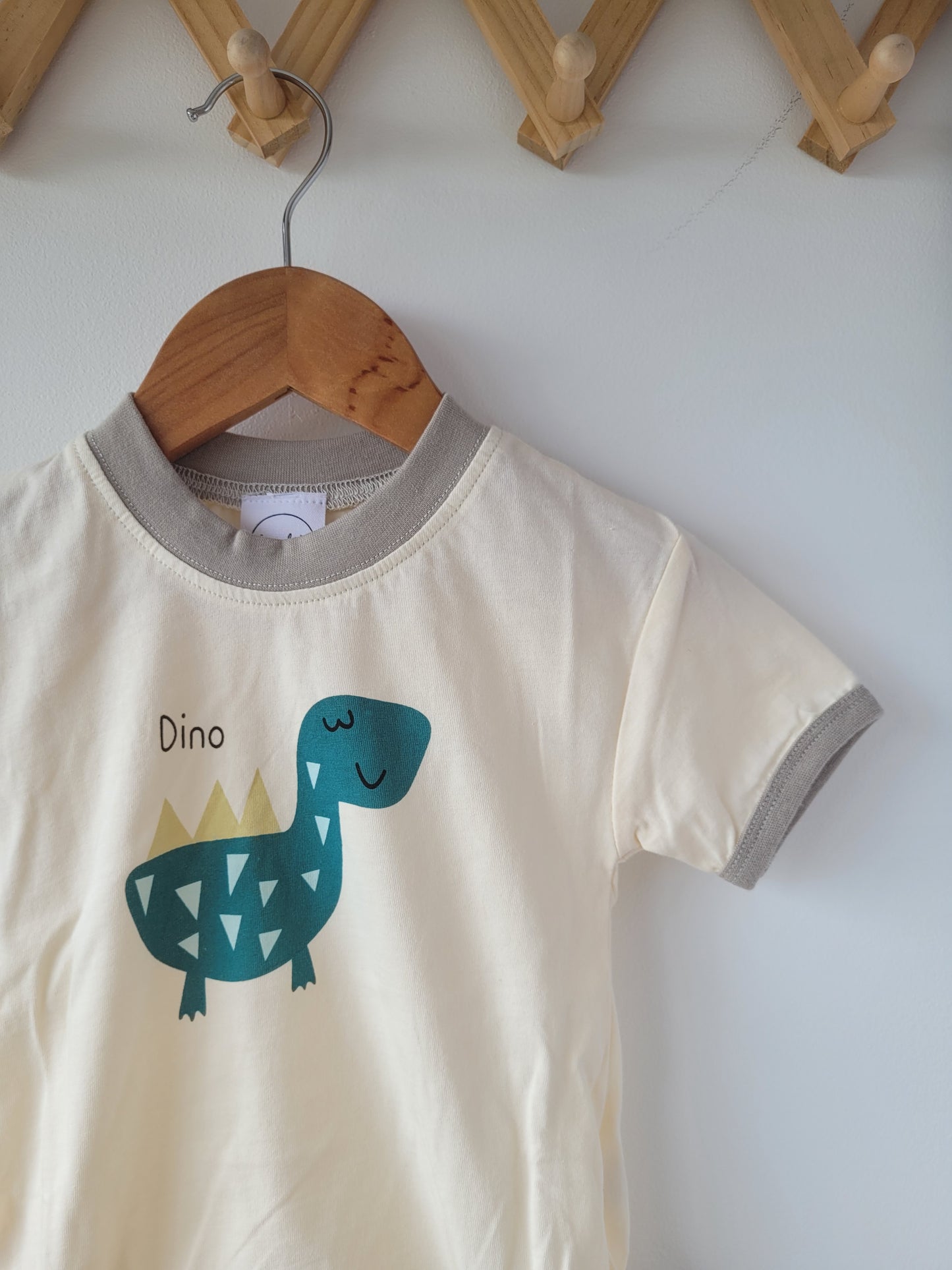 Happy dino romper