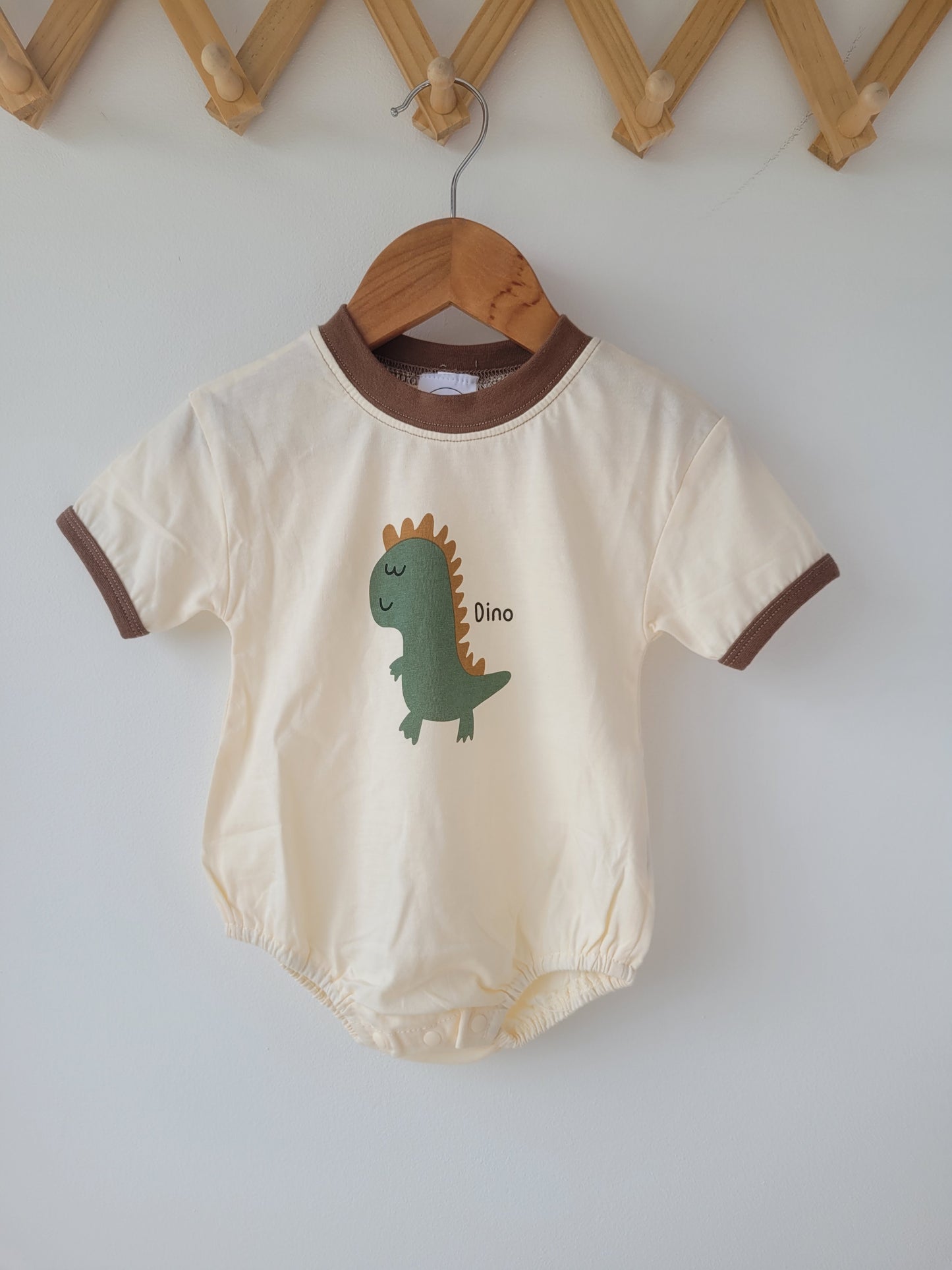 Happy dino romper brown